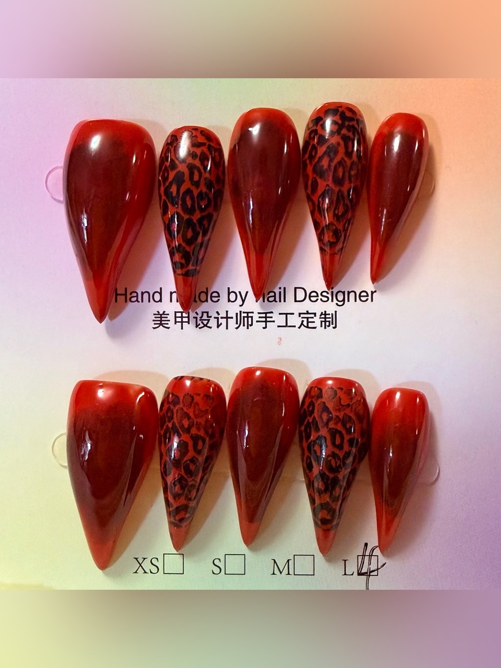 Red claw stiletto nails